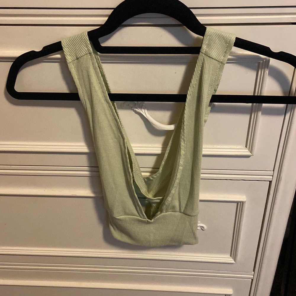 Low cut green tank makes ur chest look good cute to go out in